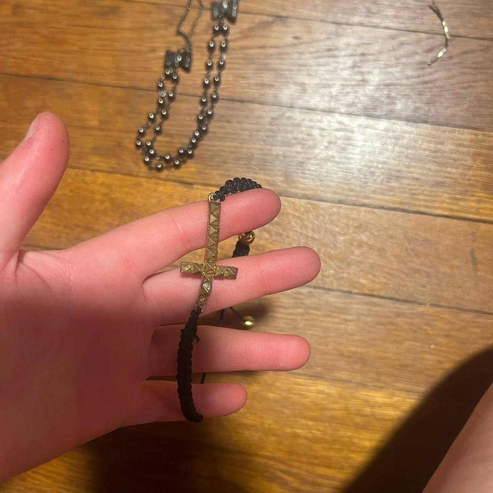 black and gold cross bracelet